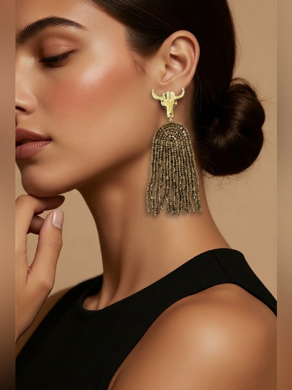 nOir NWOT Jewelry Gold Tassel Earrings with Bull Design
